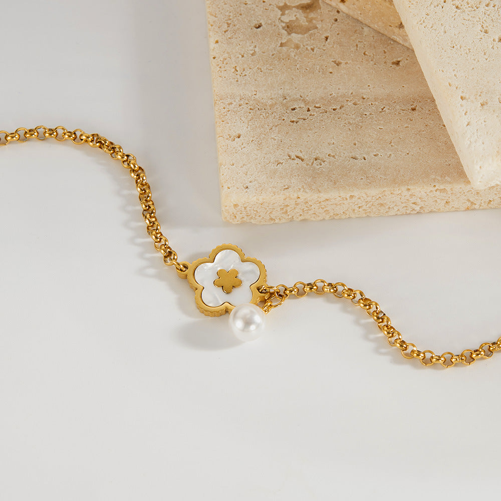 Bracciale in Acciaio e Madreperla – Fiore Elegante