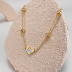 Bracciale Cuore in Titanio e Madreperla – Stile Elegante