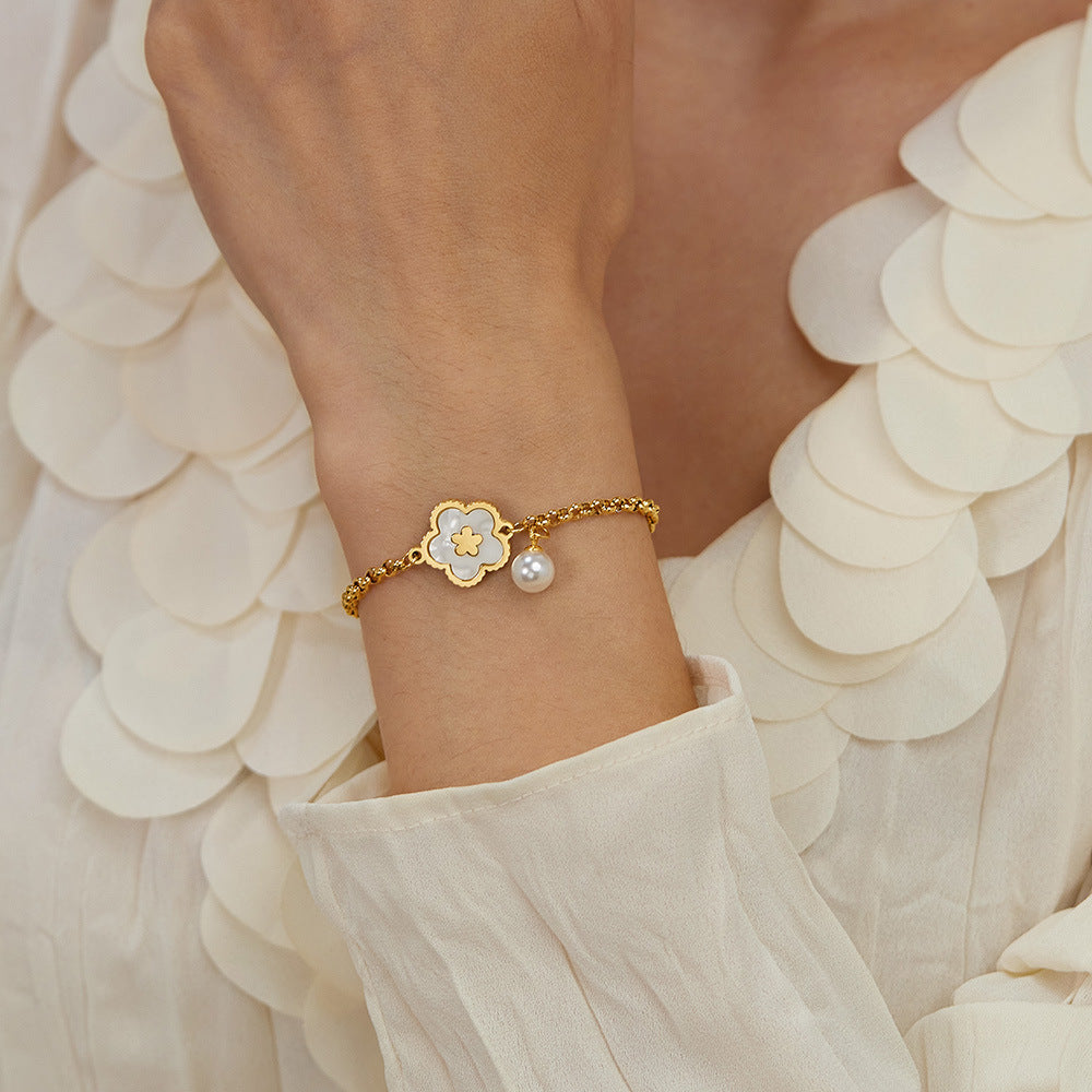 Bracciale in Acciaio e Madreperla – Fiore Elegante