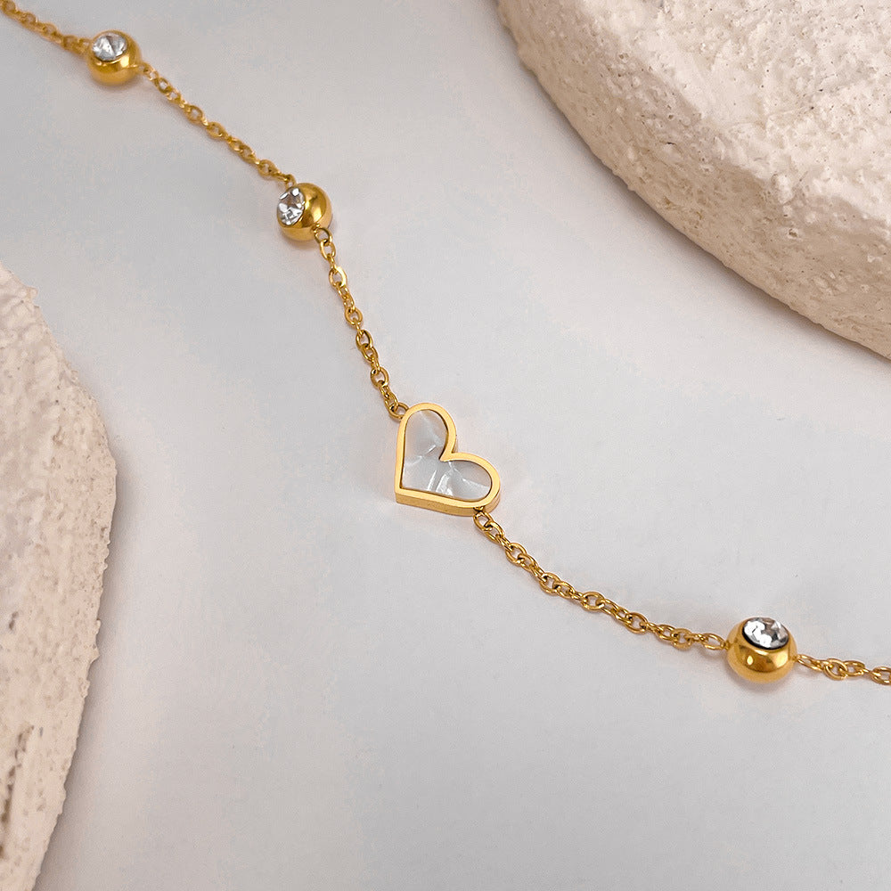 Bracciale Cuore in Titanio e Madreperla – Stile Elegante