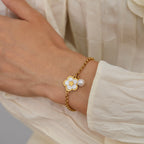 Bracciale in Acciaio e Madreperla – Fiore Elegante